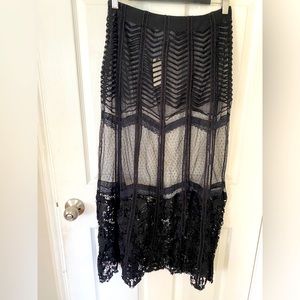 New with tags! Unlined black maxi skirt!